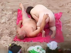 Horny matures caught at the nude beach